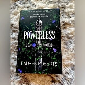 Powerless hardcover book with dust cover by Lauren Roberts